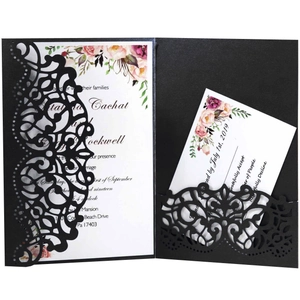 Elegant laser cut wedding invitation set with floral card and black lace sleeve