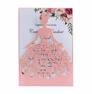Elegant laser cut wedding invitation card featuring a pink dress design with vine patterns