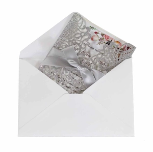 Silver glitter laser-cut invitation set with floral card and elegant grey ribbon