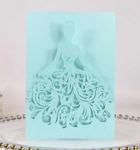 Detail of laser cut wedding card showing elegant bride silhouette with intricate patterns