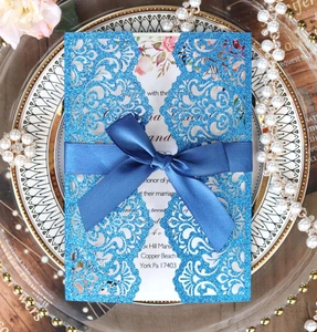 Laser cut royal blue glitter wedding invitation card with ribbon and floral insert