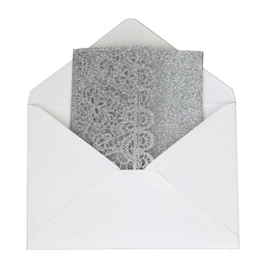Silver glitter laser-cut greeting card with white envelope for wedding invitations