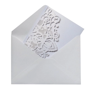 Elegant laser cut white pearlescent wedding invitation with intricate butterfly patterns