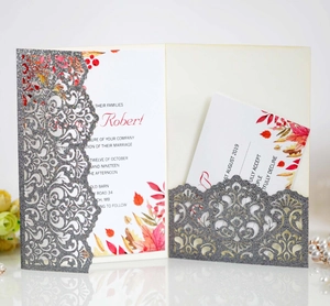 Elegant laser-cut silver glitter wedding invitation with autumn leaf print inserts