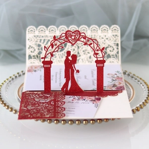 3D pop-up wedding invitation card in red glitter paper with laser cut bride groom silhouette