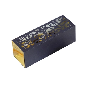 Laser cut black and gold wedding favor box for chocolates with intricate hollow patterns