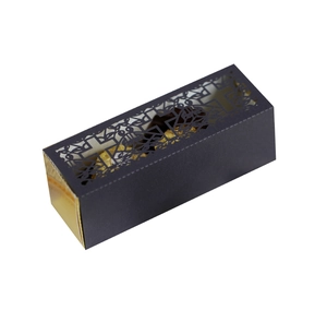 Laser-cut hollow cross candy box in matte black and gold for wedding favors