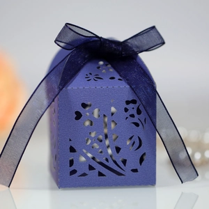 Elegant purple hollow floral laser cut candy gift box with navy blue organza ribbon bow