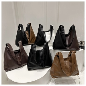 Collection of minimalist faux leather tote bags in various neutral and contrast colors