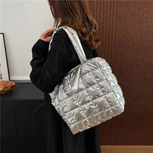 Quilted silver metallic tote bag with large capacity and padded shoulder strap style