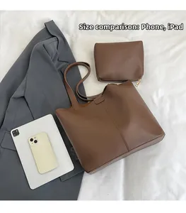 Brown leather tote bag size comparison with iPad and smartphone showing large capacity