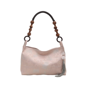 Pink New Chinese style embroidered handbag with landscape motifs and wooden bead handle