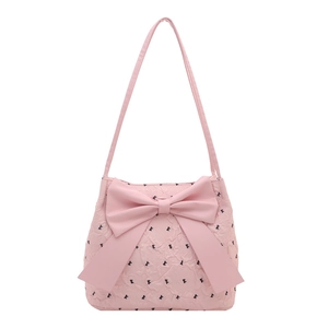 Pink seersucker tote bag with large bow and black polka dot patterns for women