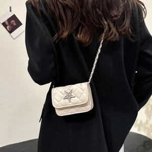 Quilted off-white mini crossbody bag with silver star logo and metal chain strap