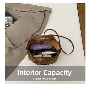 Top view showing large capacity interior of brown vintage tote with daily essentials