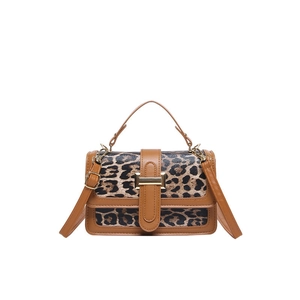 Sac à main vintage à imprimé léopard avec garniture en cuir brun et poignée femme