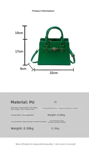 Detail view of green PU leather handbag with metal turn-lock and dimensions for commuting