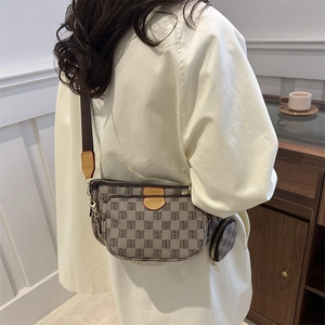 Vintage 3-in-1 monogram shoulder bag with jacquard canvas and wide strap on model