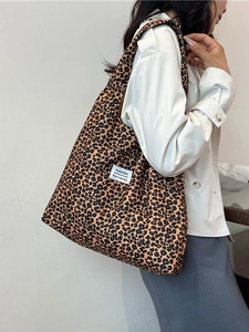 Stylish leopard print canvas tote bag with large capacity for women on gray background