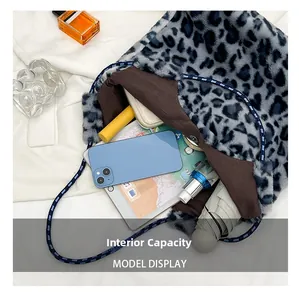 Large capacity leopard print plush tote bag showing spacious interior with daily essentials