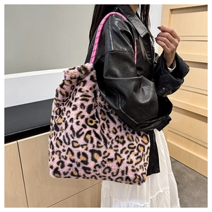 Detail view of pink leopard faux fur tote bag with soft texture and pink rope straps