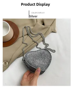 Silver heart-shaped rhinestone mini evening bag with metal chain strap detail