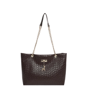 Women's dark brown woven tote bag with chain strap and deer pendant on white background
