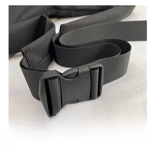 Macro detail of high-density black nylon webbing and durable plastic buckle fastener