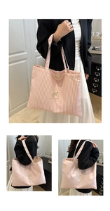 Detailed views of pink striped canvas tote bag showing shoulder strap and fabric texture
