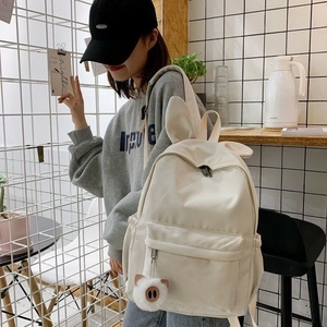 Sac à dos blanc esthétique avec oreilles de lapin 3D et charm en peluche