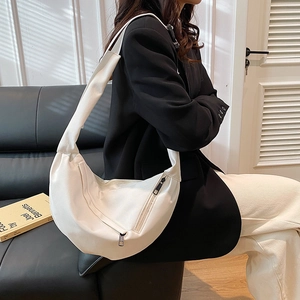 Chic white half-moon shoulder bag with minimalist design for stylish women’s daily wear