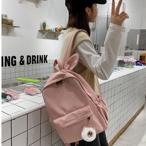 Sac à dos rose mignon avec oreilles de lapin et pendentif peluche au style coréen
