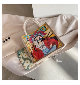 Detailaufnahme einer Canvas-Tragetasche im National-Trend-Stil mit grafischer Illustration