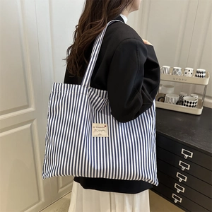 Minimalist blue and white striped canvas tote bag for women with large capacity