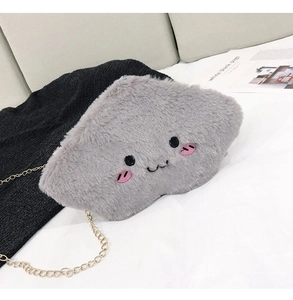 Detailed view of grey plush cloud bag with cute facial embroidery and golden chain