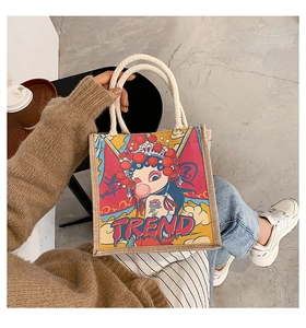 Close-up of retro jute tote bag with modern Chinese opera girl print and rope handle