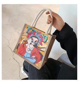Close-up of a stylish canvas tote featuring a traditional opera girl digital print