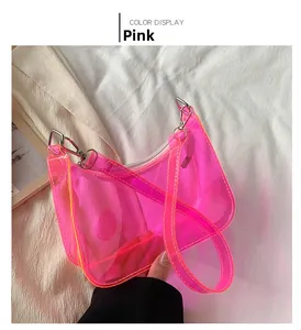 Detailed close-up of pink transparent PVC jelly bag with metallic silver clips