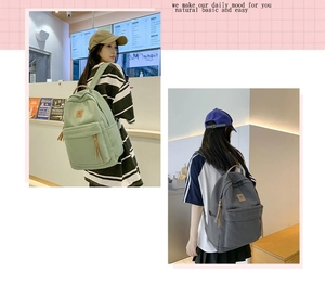 Minimalist nylon school backpack for students with dual shoulder straps and side pockets