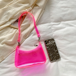 Neon pink transparent PVC shoulder bag with Y2K aesthetic and silver zip detail