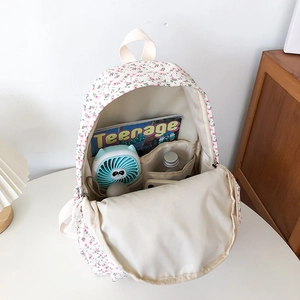 Japanese style floral canvas backpack with spacious interior compartments for students