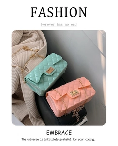 Detail of mint green and peach pink quilted jelly mini bags with gold chain straps