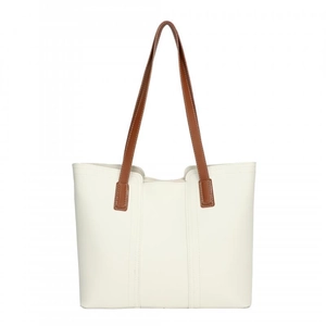 Minimalist cream tote bag with brown leather handles and premium stitching for commute