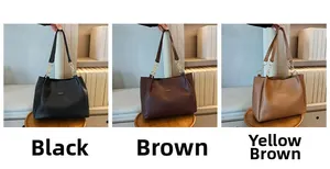 Tre grandi borse tote in pelle nei colori nero, marrone e cuoio con catena metallica
