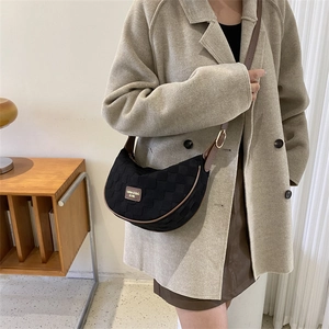 Fashion checkered crescent crossbody bag with brown leather strap and gold plaque detail