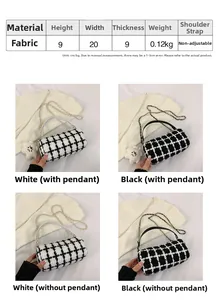 Detail view of checkerboard cylinder bag with dimensions 20x9x9cm and chain strap
