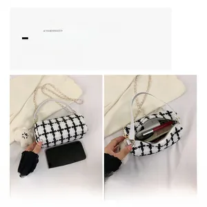 Detail view of plaid tweed handbag capacity showing space for phone and makeup
