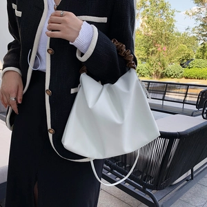 Elegant white pleated cloud bucket bag with brown ruched handle for women commute style