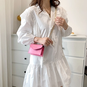 Mini bright pink chain shoulder bag for women with gold strap and envelope flap