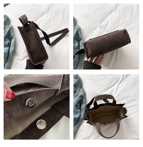 Detail view of brown corduroy tote bag showing magnetic closure and interior space